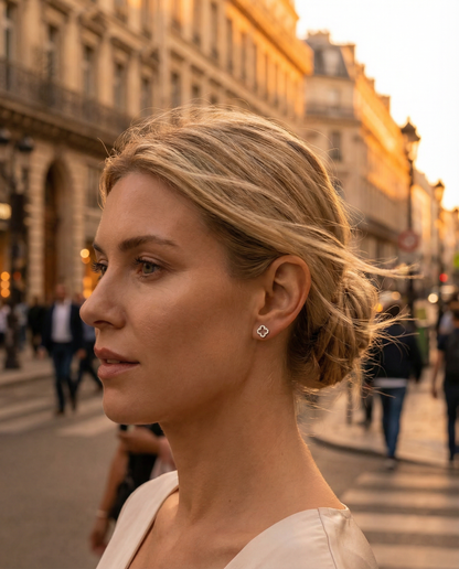 Clover Earrings — Woman in profile on a Parisian street at sunset