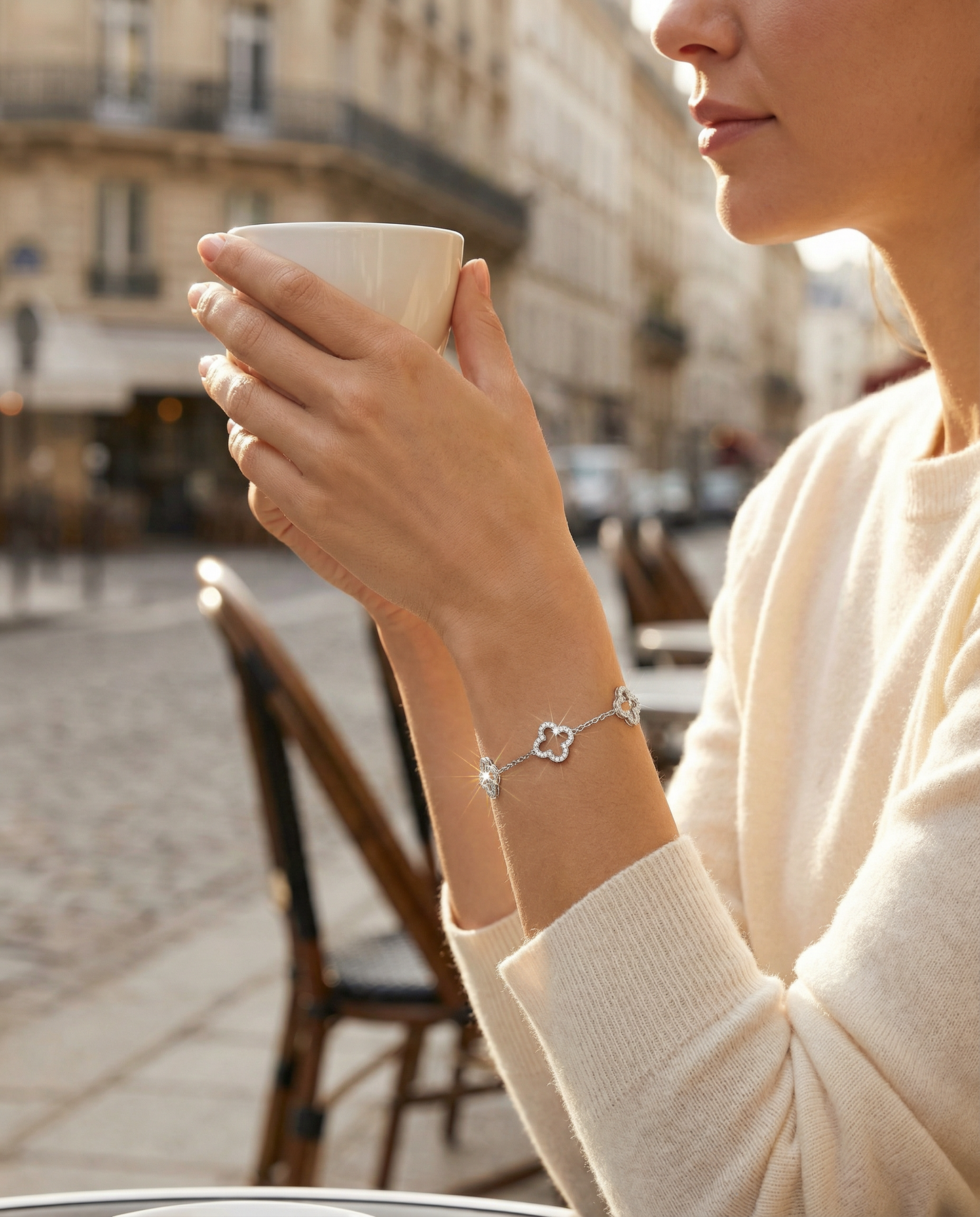 Clover Bracelet — Parisian café terrace, golden morning light